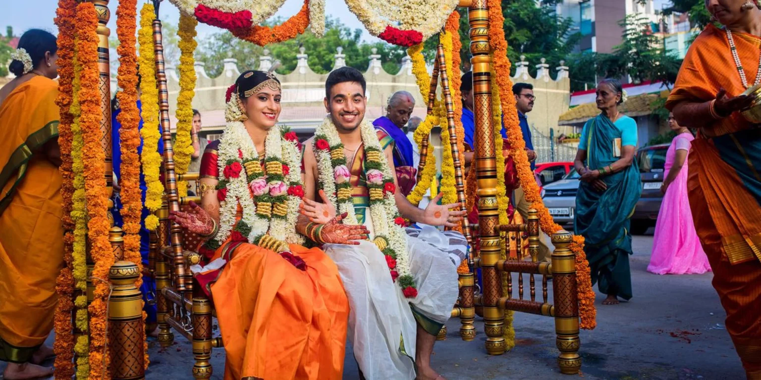 Couple on a flower-decorated swing